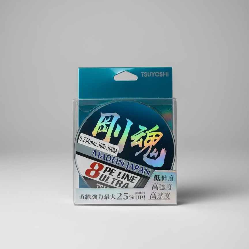 Fishing line packaging with Tsuyoshi branding on a textured surface